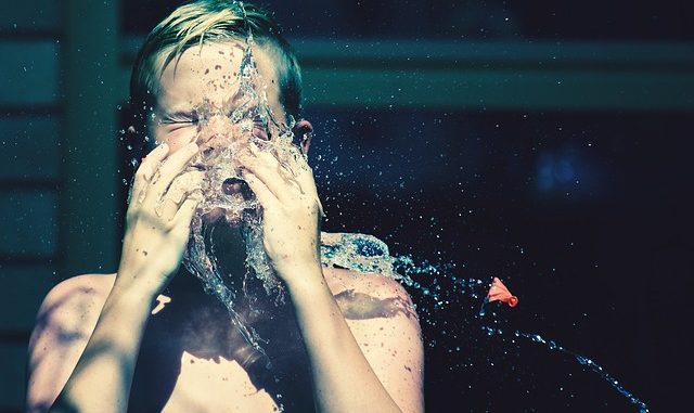 Child Washing Face